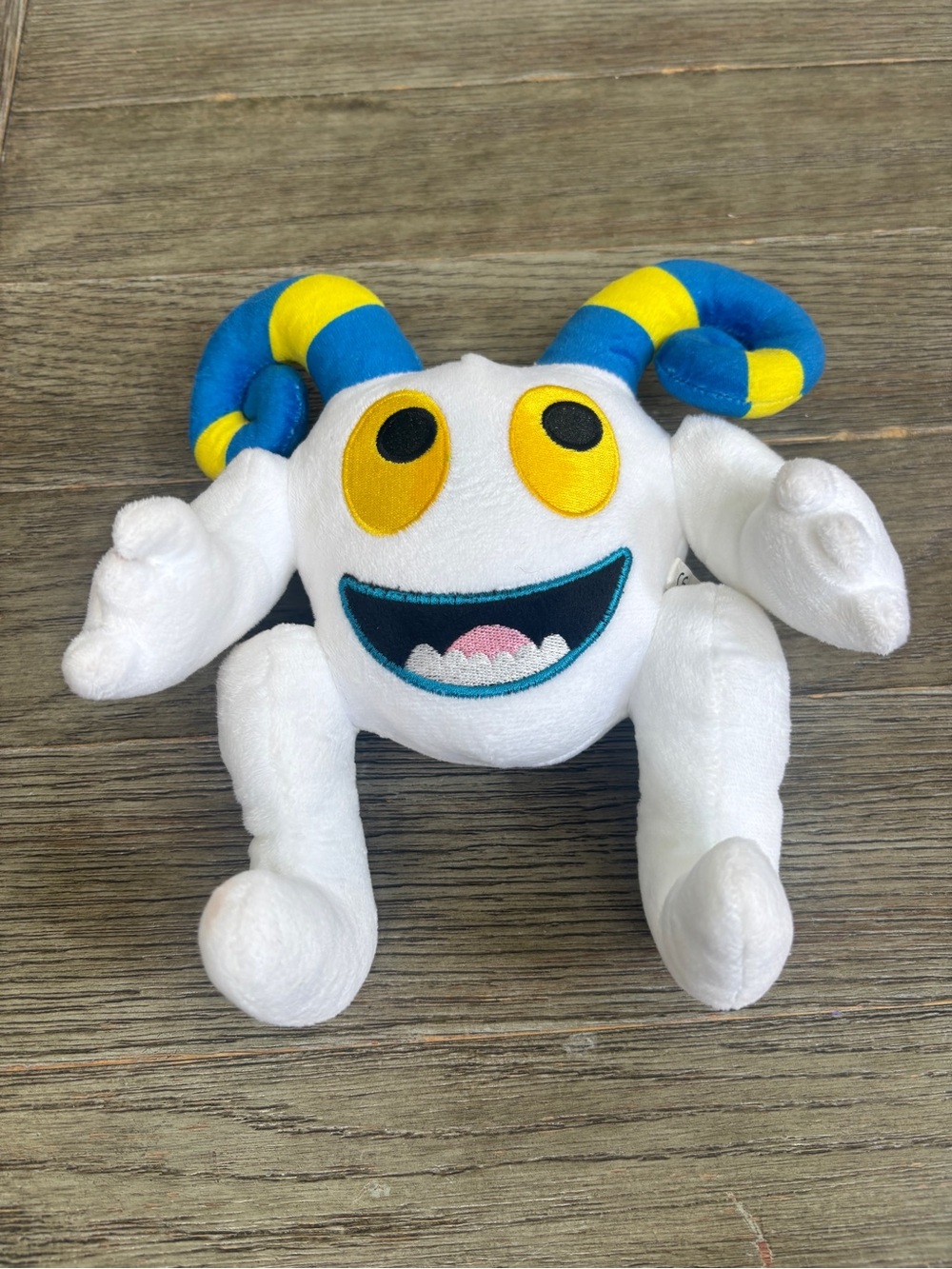 My singing Monster Toy with Blue & Yellow Horns - Kids Plush